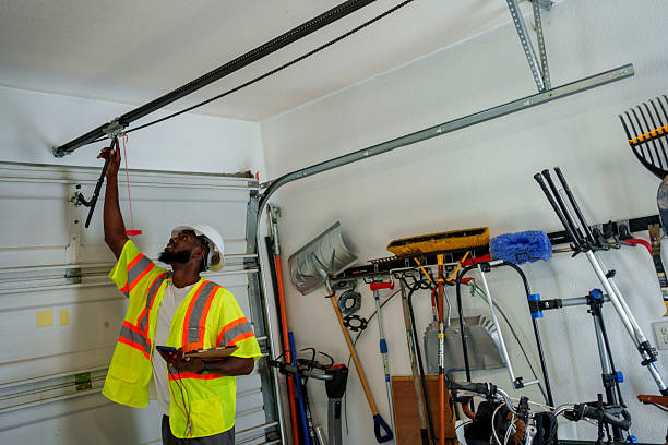 Professional Garage Door Panel Replacement technician working in Bloomington, IN
